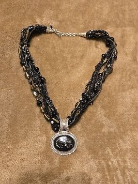 Multi-Strand Black Beaded Necklace with Decorative Pendant